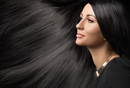 beautiful young woman with black shiny hair - GNC India Biotin shampoos